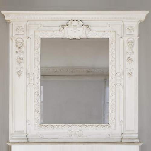 Trumeau ancien de style Louis XIV à décor de têtes de lions