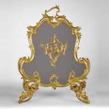 Pare étincelle ancien de style Louis XV en bronze doré à l'Allégorie de l'Hiver
