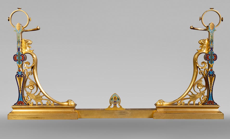 Paire de chenets de style Napoléon III en bronze doré au décors émaillé-0