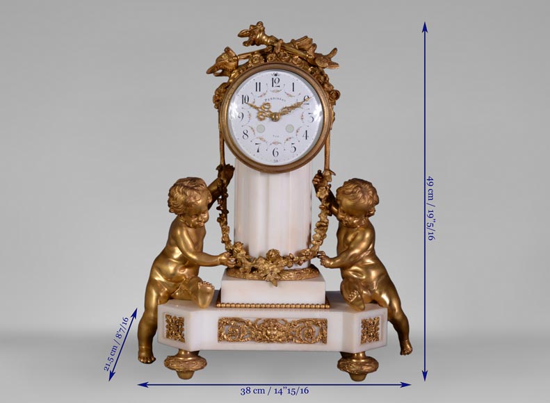 Petite pendule aux putti de Perrineau, de style Louis XVI-12