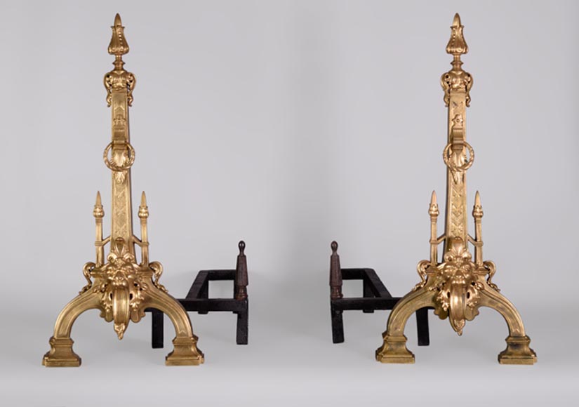 Paire de chenets ancienne de style Napoléon III en bronze doré aux têtes de lions -0