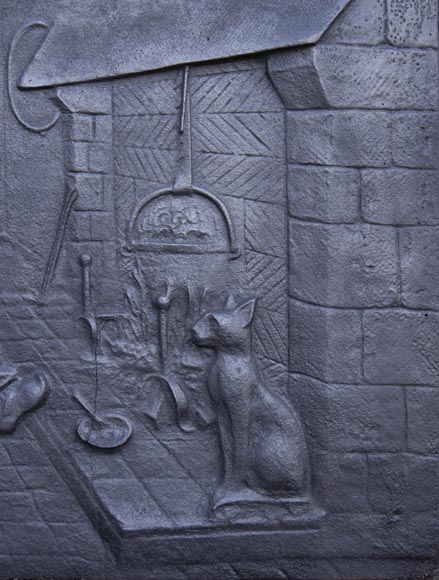 Plaque de cheminée moderne à décor d'un personnage et son chat se réchauffant près du feu-1