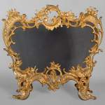 Très riche pare étincelle de style Louis XV en bronze doré