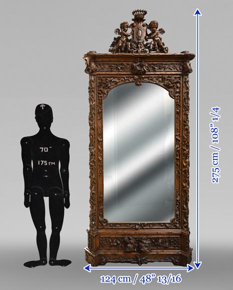 TAHAN (attribué à) — Importante armoire à glace en noyer sculpté à décor naturaliste-19