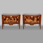 Giuseppe MAGGIOLINI (1738 – 1814)(Entourage de),Remarquable paire de commodes néoclassiques à décor de marqueterie présentant un « Départ pour la chasse » et un « Retour de la chasse », début du XIXe siècle