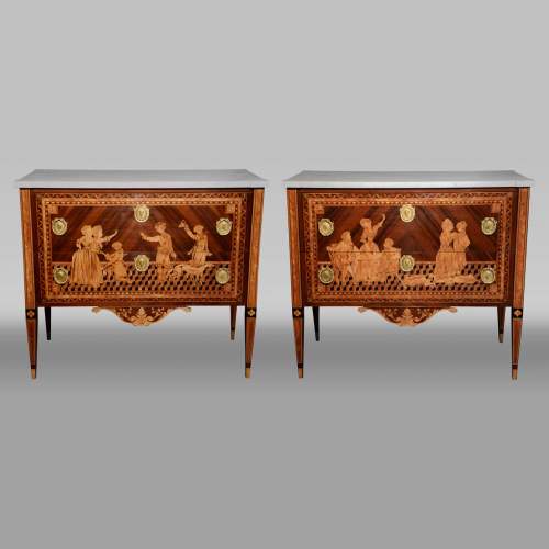 Giuseppe MAGGIOLINI (1738 – 1814)(Entourage de),Remarquable paire de commodes néoclassiques à décor de marqueterie présentant un « Départ pour la chasse » et un « Retour de la chasse », début du XIXe siècle