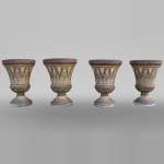 Quatre vases de jardin en mosaïque