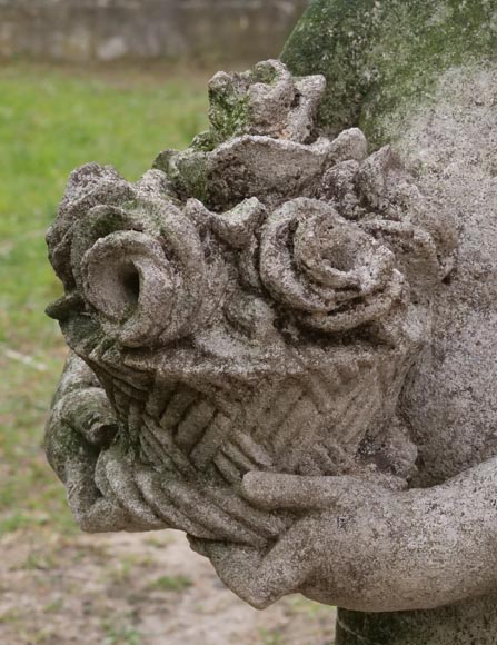 Sculpture d’un putto au panier fleuri en pierre composite-3