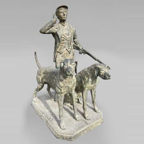 Chasseur et ses deux chiens, statue de parc en bronze à patine verte