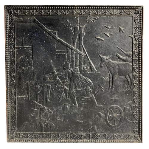 Plaque de cheminée au décor de scène paysanne