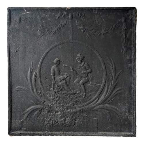 Plaque de cheminée de style Louis XVI au joueur de luth