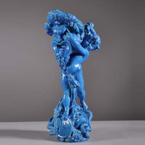 Joseph CHERET (1838 - 1894) pour la Manufacture de Sèvres "Putto et masques de théâtre grec" Vide poche en faïence vernisée bleue
