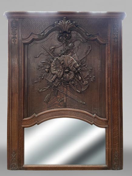 Trumeau en bois sculpté à décor de cornemuse-0