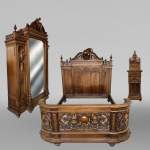 Louis MALARD, chambre à coucher en noyer sculpté