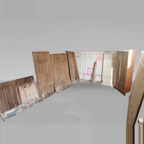 Boiserie de soubassement de style néogothique en chêne à décor de plis de serviette, environ 7 mètres linéaires