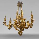 CAFFIERI (d'après). Exceptionnel lustre en bronze de style Louis XV