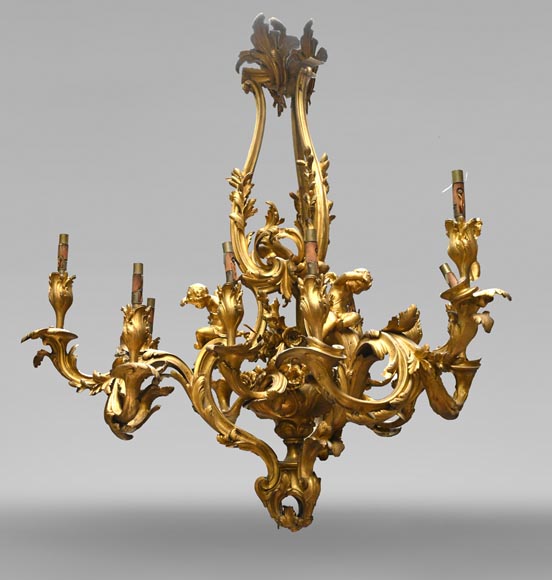 CAFFIERI (d'après). Exceptionnel lustre en bronze de style Louis XV-0