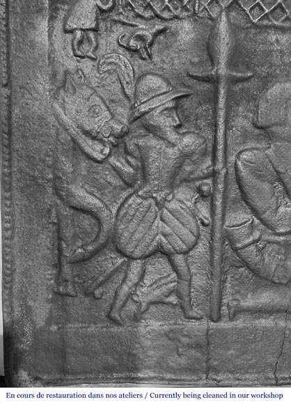 Plaque de cheminée en fonte représentant 