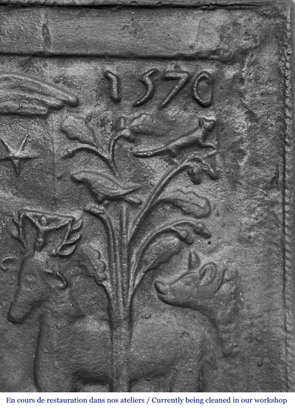 Plaque de cheminée en fonte représentant 