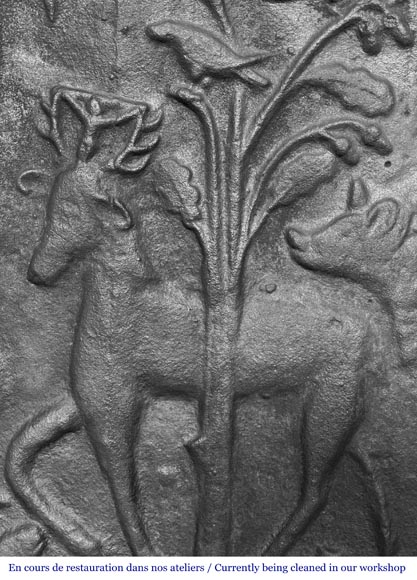 Plaque de cheminée en fonte représentant 