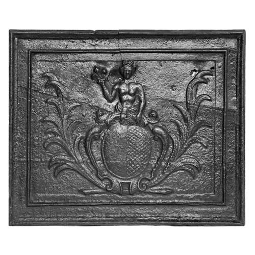 Plaque de cheminée aux armories surmontées par Apollon tenant une fleur de Lys