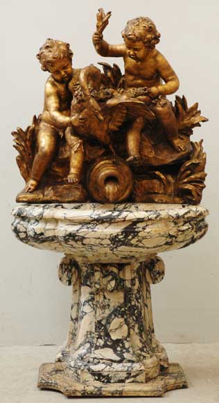 Gilded garden fountain with putti and swan_fr