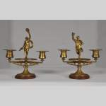 "La Bacchanale", paire de bougeoirs en bronze doré et marbre Rouge Griotte