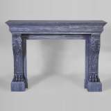 Belle cheminée de style Restauration à pattes de lions en marbre Bleu Turquin