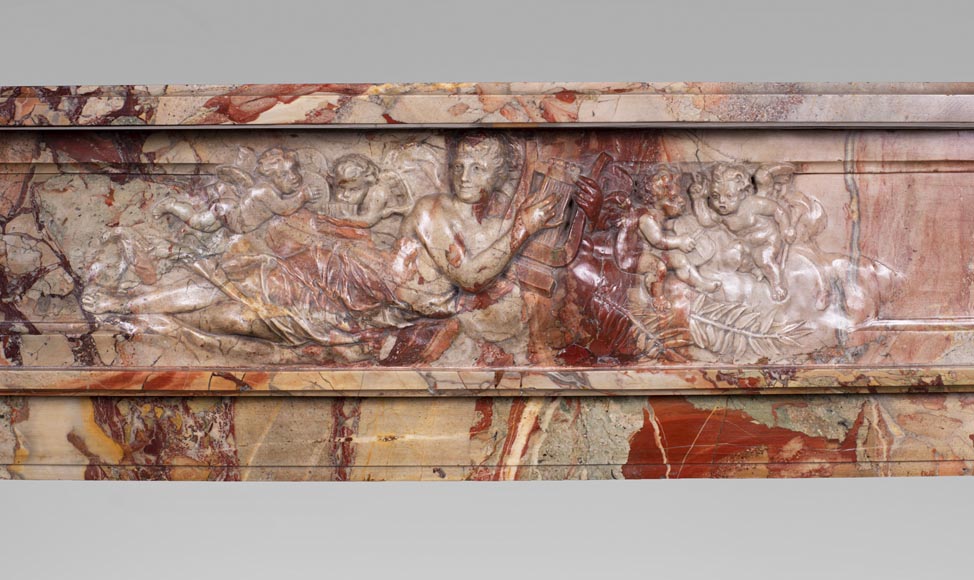 Cheminée ancienne de style néo-classique, en marbre Sarrancolin richement sculpté sur le thème des arts-1