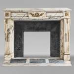 Cheminée de style Louis XVI à bronze en marbre Panazeau