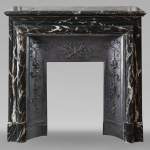 Cheminée de style Louis XIV en marbre noir Marquina