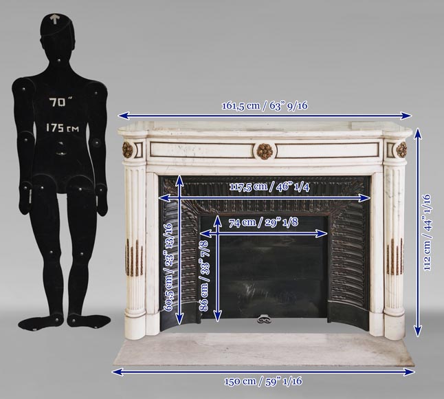 Cheminée de style Louis XVI galbée à demi colonnes sculptée en marbre demi statuaire au décor de bronze-14