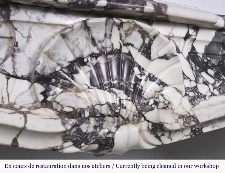 Cheminée de style Louis XV en brèche violette, décorée d'une coquille-2
