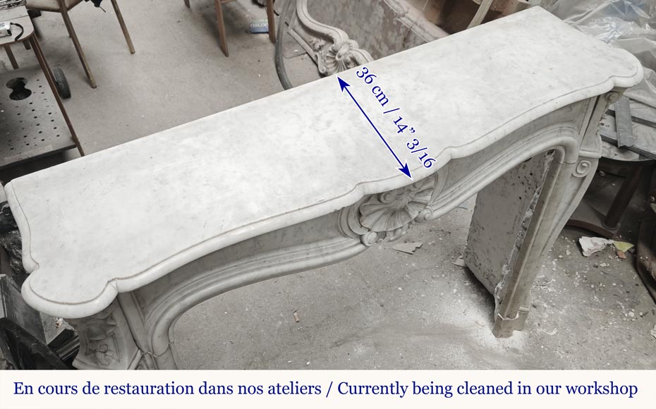Cheminée style Louis XV en marbre de Carrare décorée d'une coquille-9