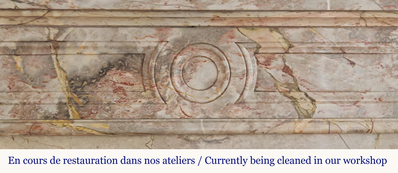 Cheminée de style Louis XVI an angle arrondie, en marbre Sarrancolin-1