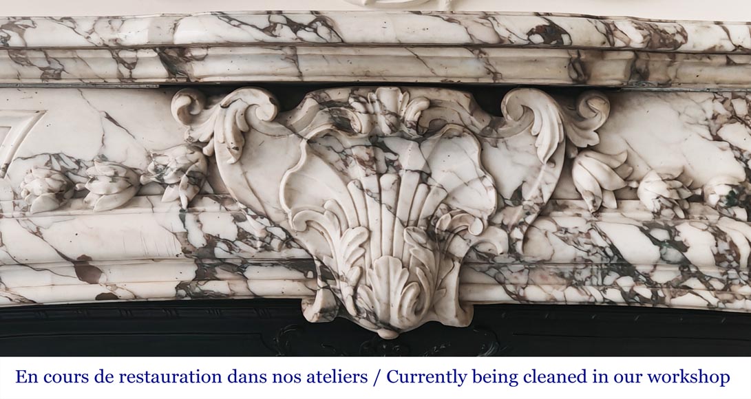 Importante cheminée de style Régence en marbre brèche violette-1