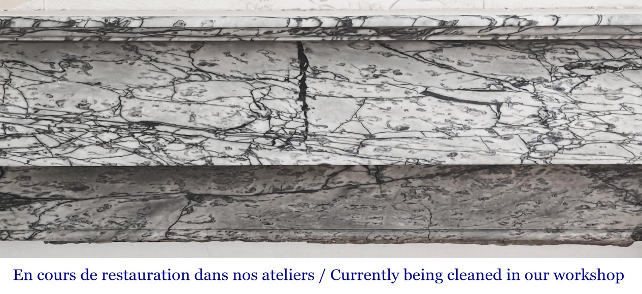 Cheminée de style Napoléon III à modillons, en marbre bleu Turquin-1