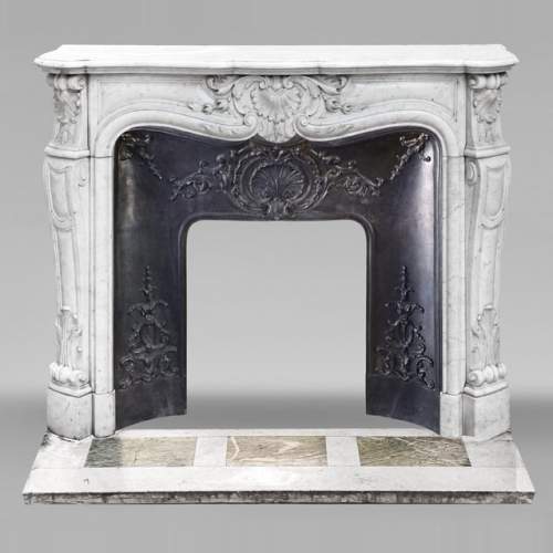 Cheminée de style Louis XV en marbre de Carrare
